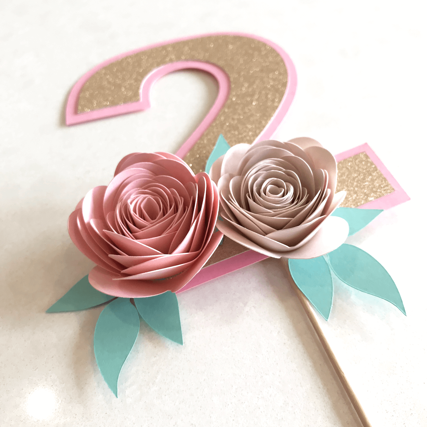 pink and rose gold floral cake topper